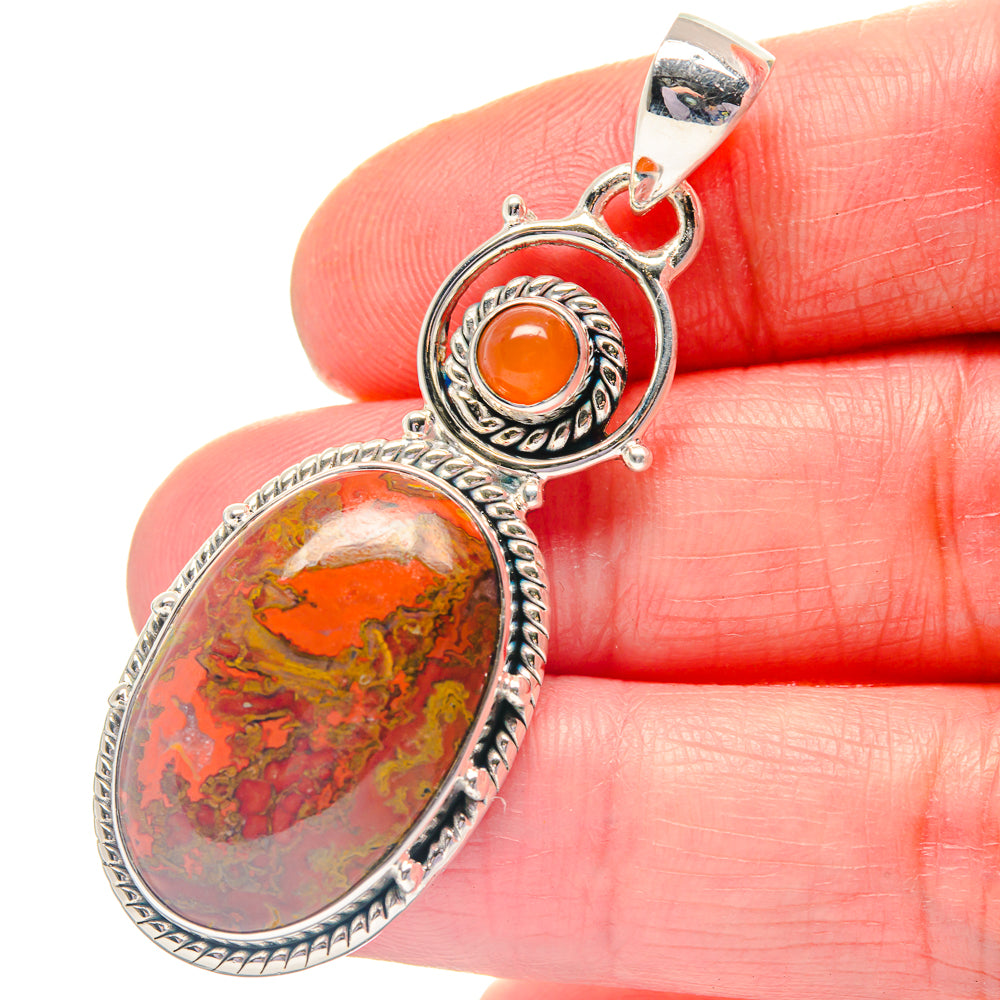 Close-up oval Moroccan agate pendant with round orange carnelian cabochon, 925 silver