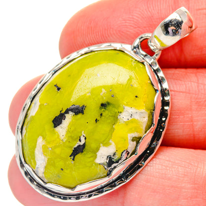 925 sterling silver bezel oval opal pendant with yellow-green stone and black speckles