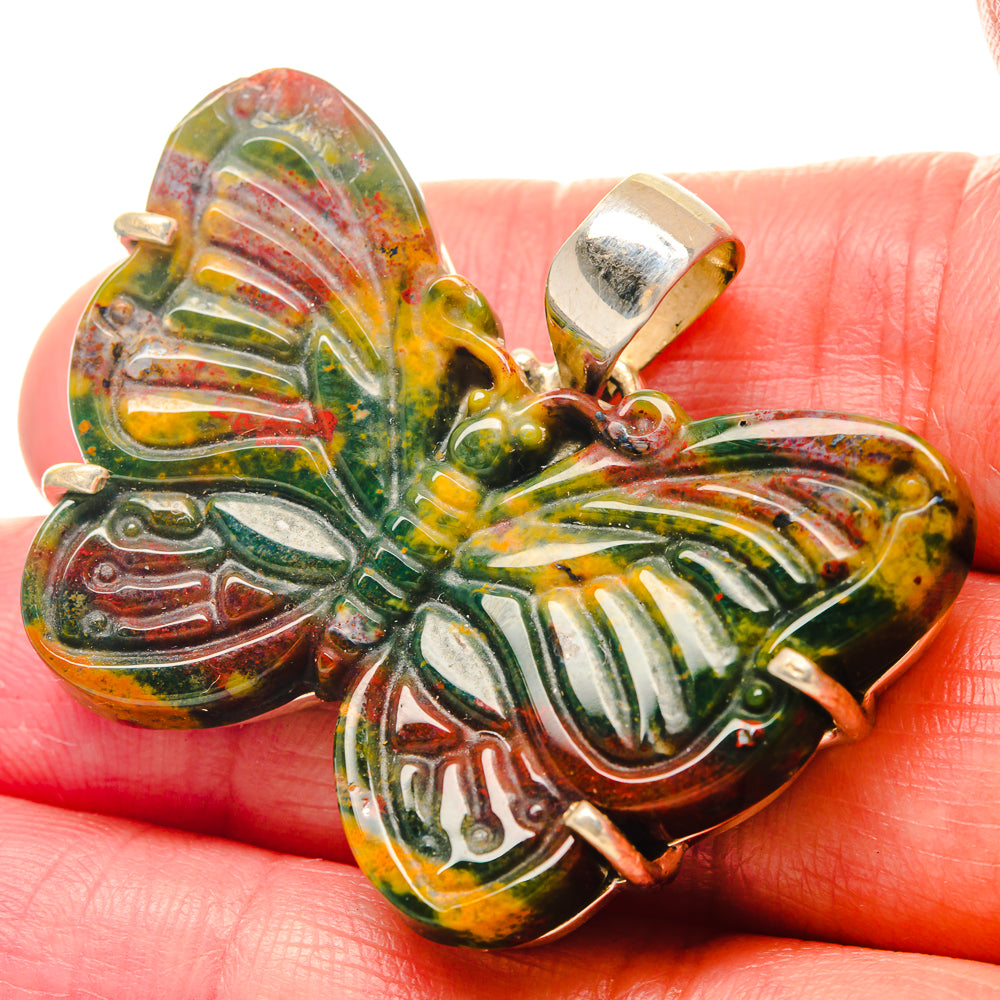 Bloodstone pendant close-up, multi-color green red cabochon with 925 silver bail