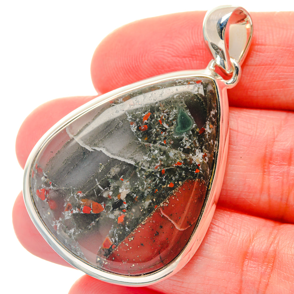 Bloodstone pendant in teardrop frame, red and green speckled stone on sterling silver bail