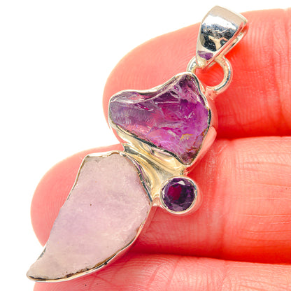 Sterling silver pendant close-up with rough pink rose quartz and purple amethyst details