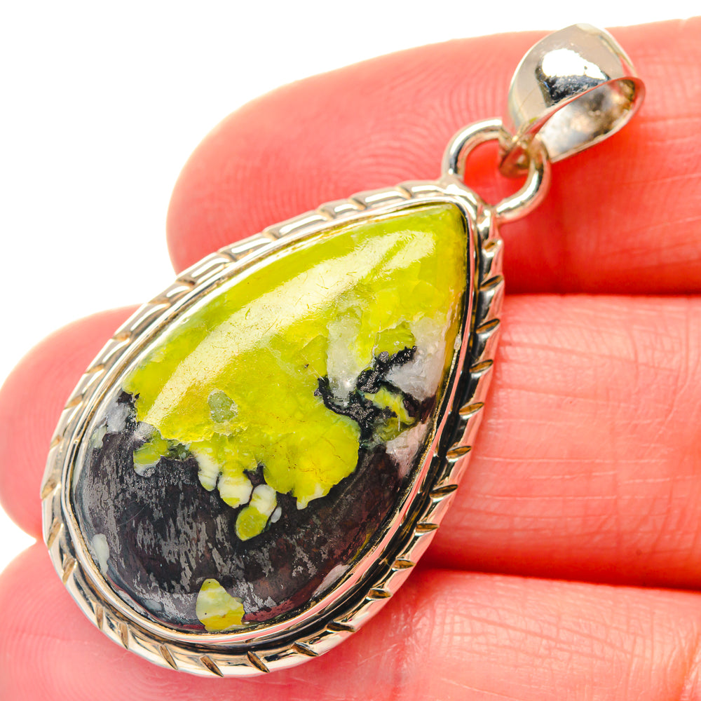 Teardrop green opal pendant in 925 sterling silver with textured bezel and bail
