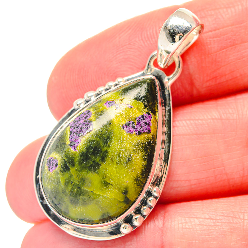 925 sterling silver teardrop pendant with green/yellow stone and purple flecks
