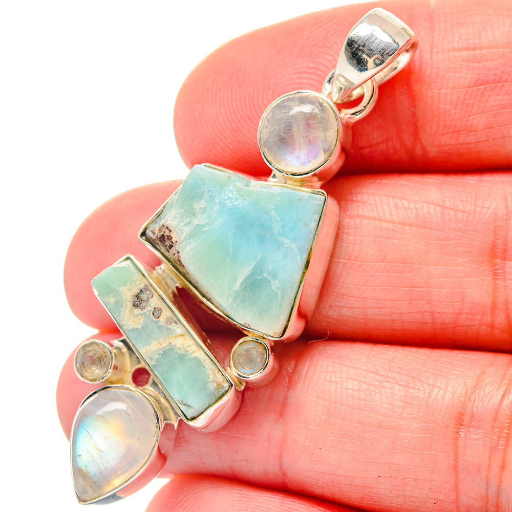 Sterling silver gemstone pendant with turquoise rough stones and iridescent round accents