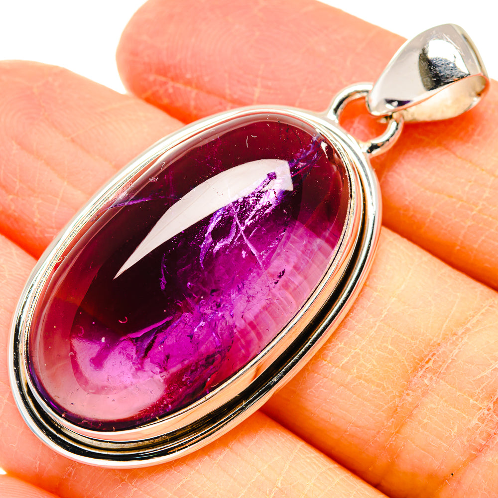 Amethyst oval pendant in 925 sterling silver bezel, purple gemstone with polished frame.