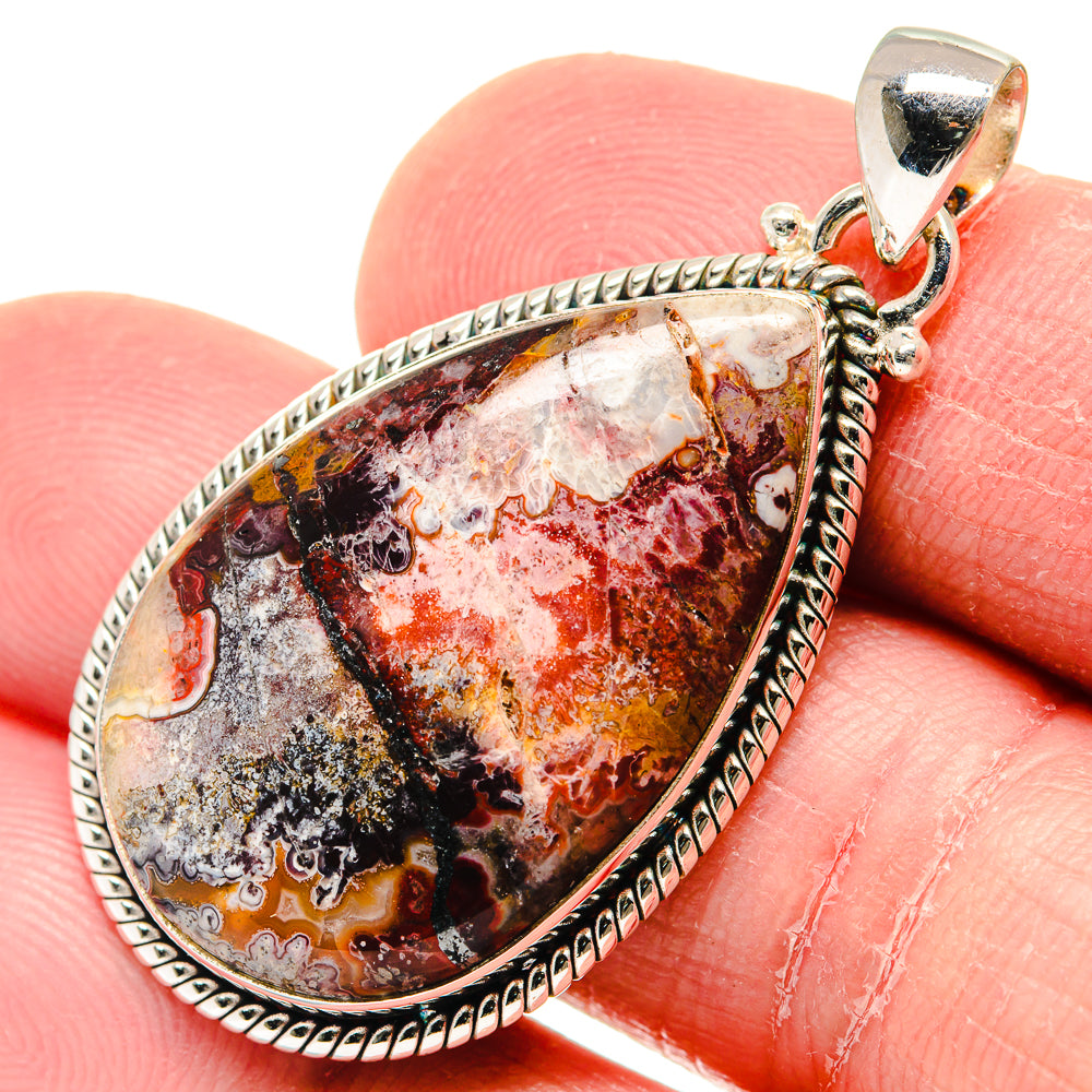 Crazy lace agate teardrop pendant close-up, 925 sterling silver bail and bezel