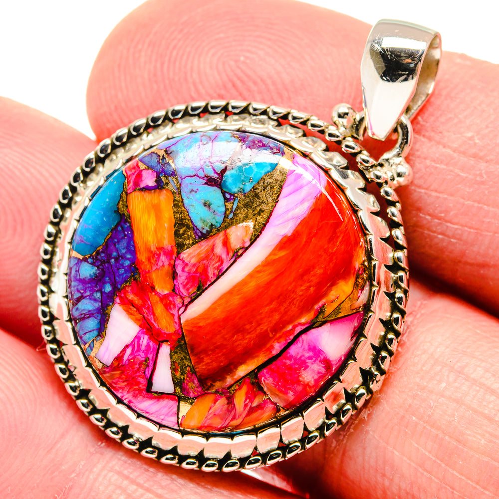 Close-up round multicolor dahlia pendant with silver bail and bezel setting
