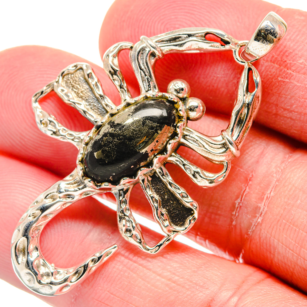 Black onyx pendant with ornate 925 sterling silver setting and top bail