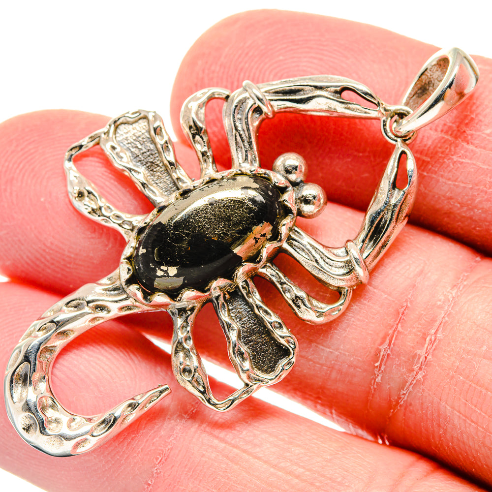 Ornate 925 sterling silver pendant with dark black stone and loop bail