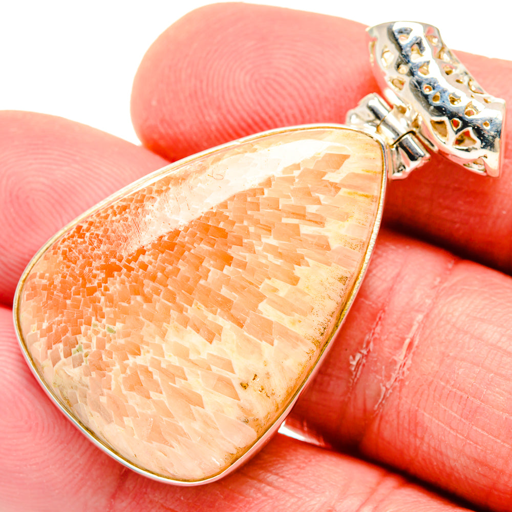 Orange peach scolecite teardrop pendant, 925 sterling silver prong setting with bail.
