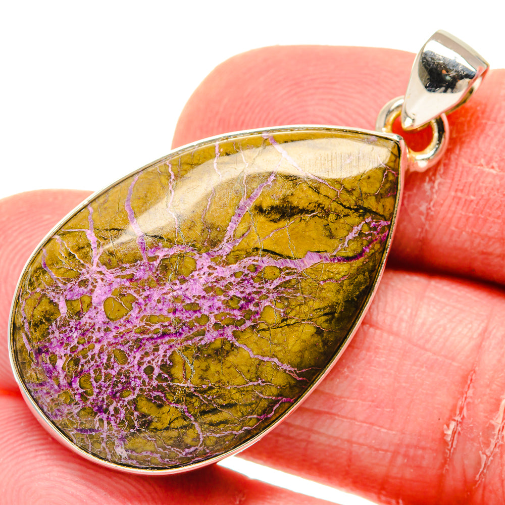 Atlantisite pendant in 925 sterling silver with yellow teardrop stone and purple veining