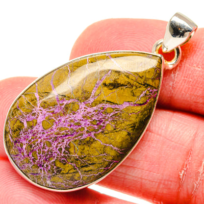 Atlantisite pendant in 925 sterling silver with yellow teardrop stone and purple veining
