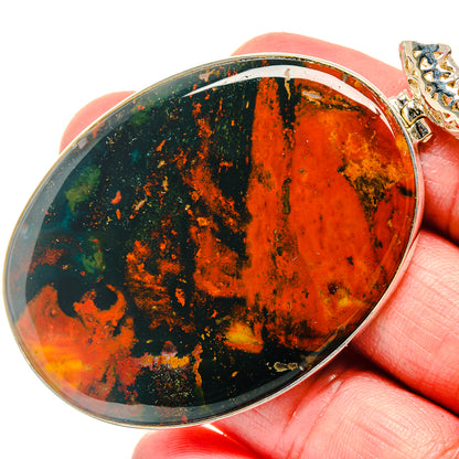 Bloodstone pendant, 925 sterling silver bezel with oval red-orange stone