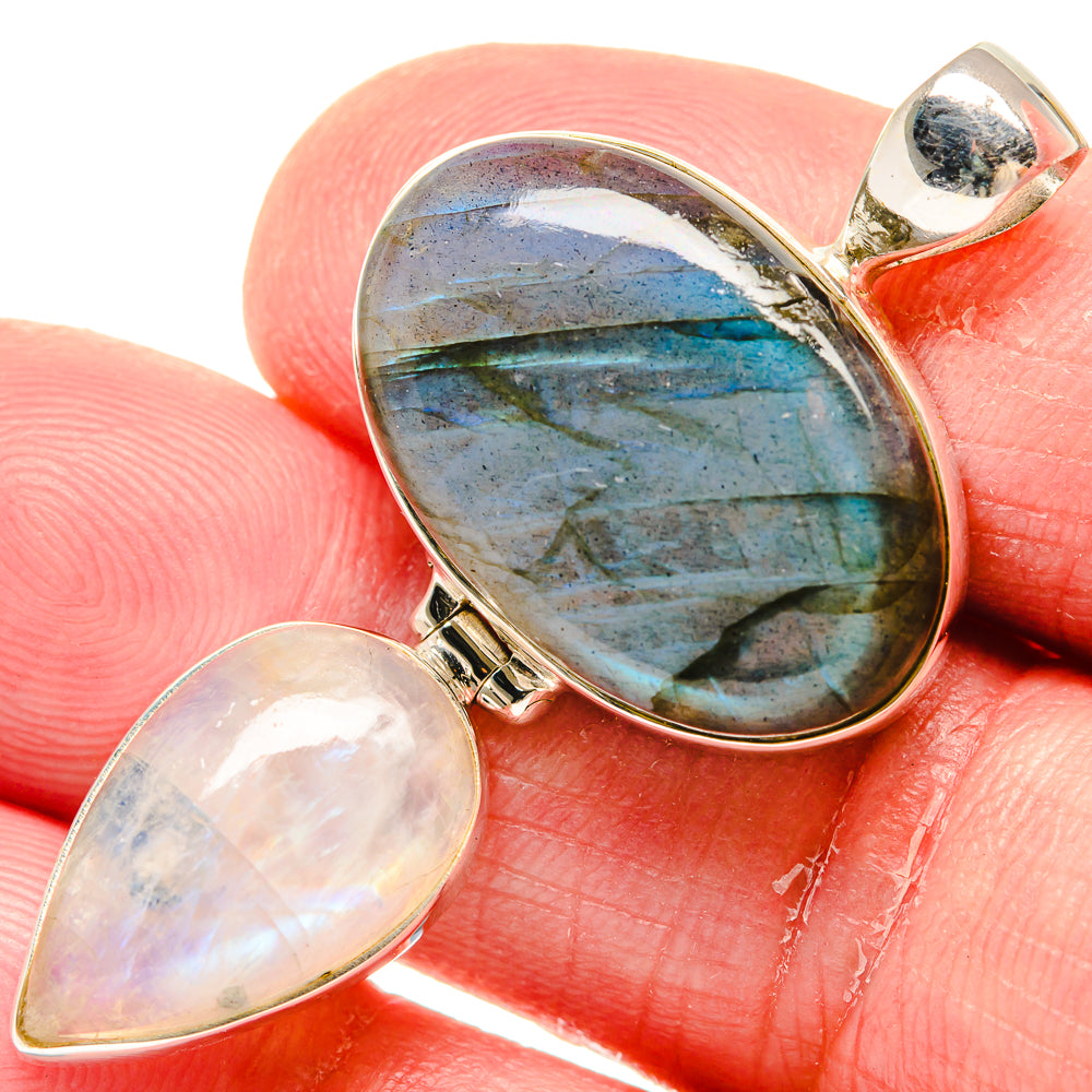 Oval labradorite and teardrop moonstone sterling silver pendant with blue-green flash