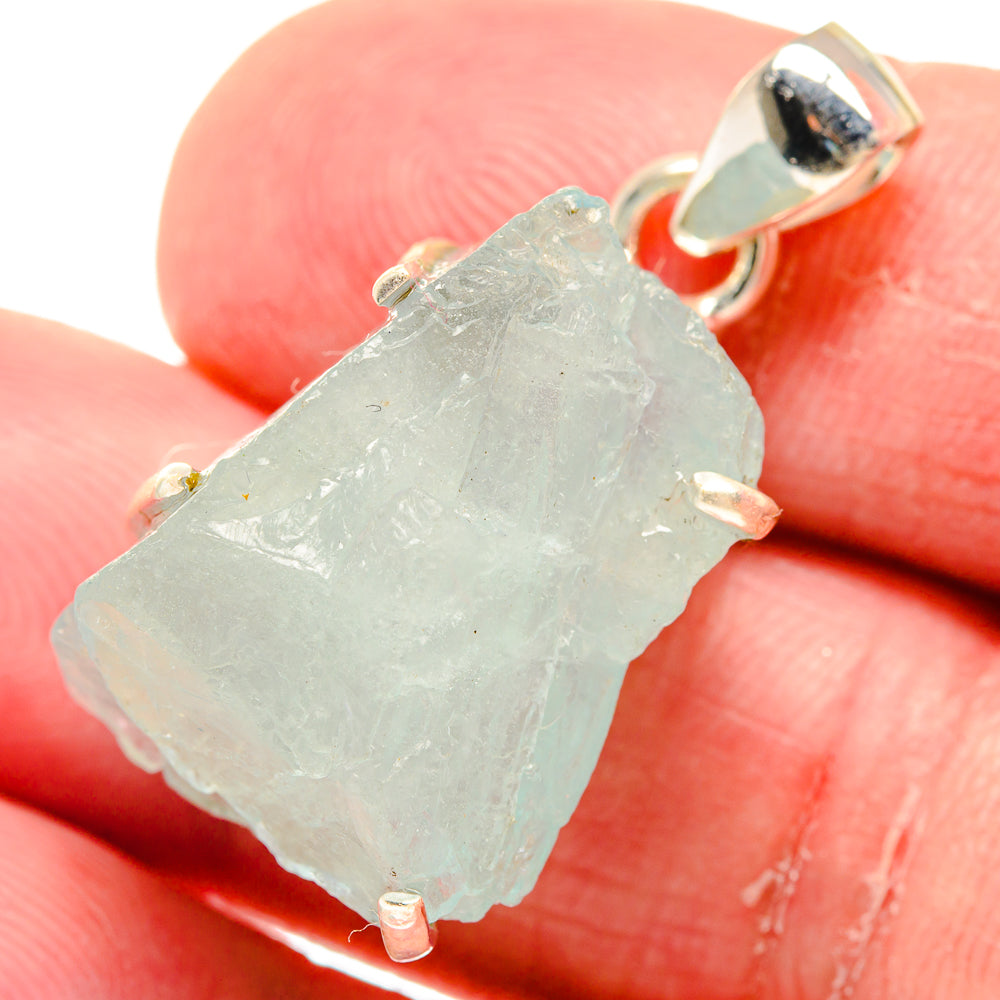 Rough aquamarine pendant with sterling silver bail, rough light aqua stone