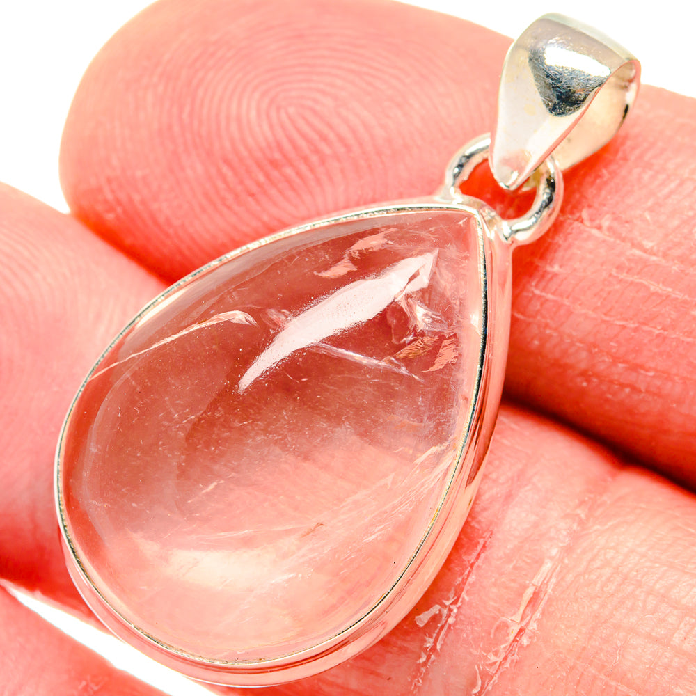 Rose quartz teardrop pendant in 925 sterling silver, polished silver bail, pink stone