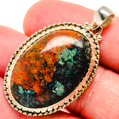 Sonora Sunrise pendant close-up: 925 sterling silver oval frame with orange, teal stone