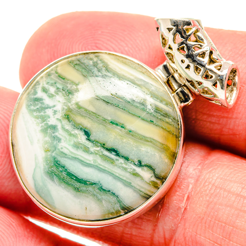 Oval ocean jasper pendant with green stripe pattern set in 925 sterling silver bezel