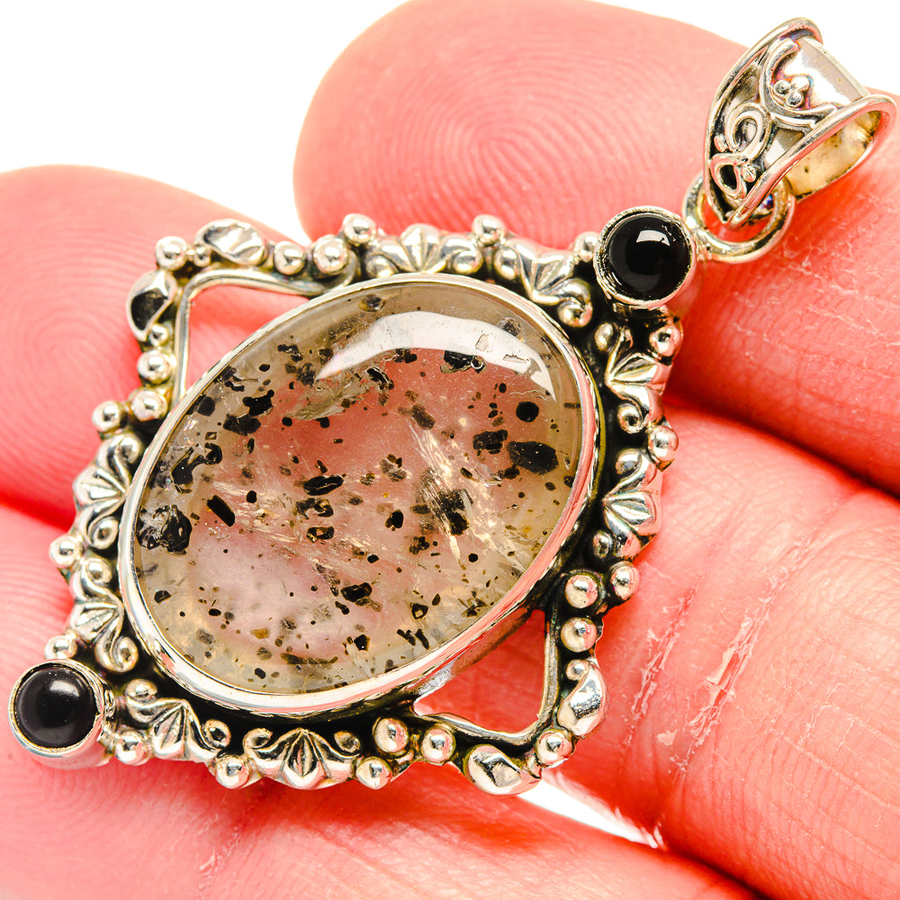 Oval Montana agate pendant in ornate 925 silver with black onyx cabochons, close-up