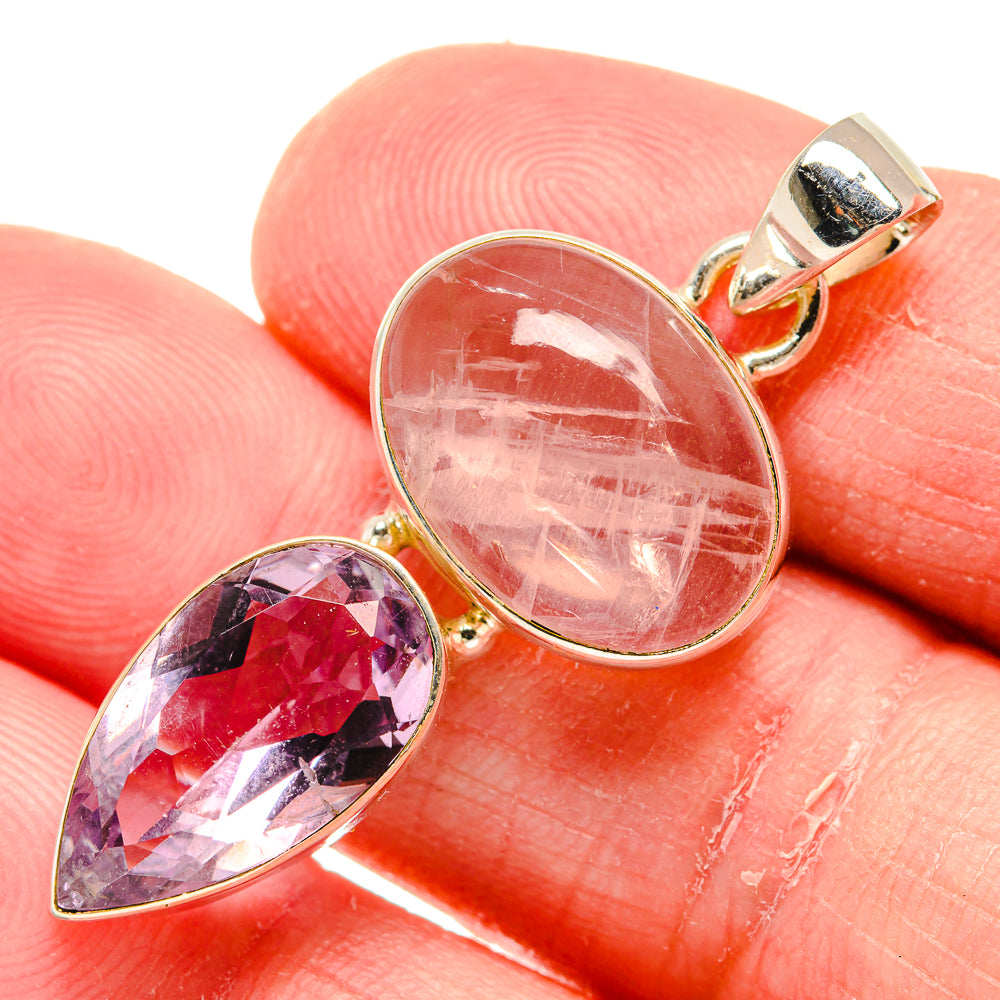 Rose quartz and amethyst pendant close-up with oval pink rose quartz and purple stone