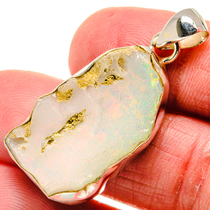 Rough opal pendant in pale white with gold speckles, with sterling silver bail