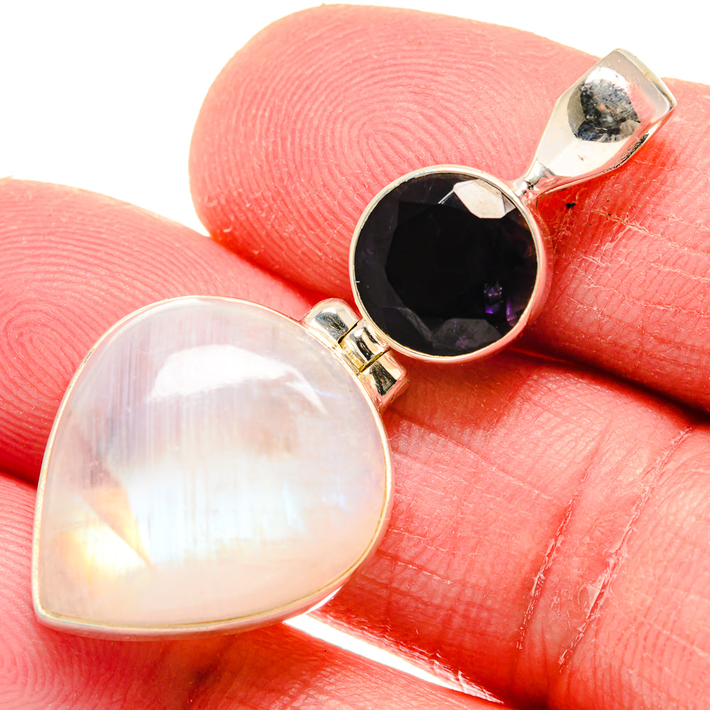 Double-stone pendant: opal moonstone and dark purple tanzanite in silver settings