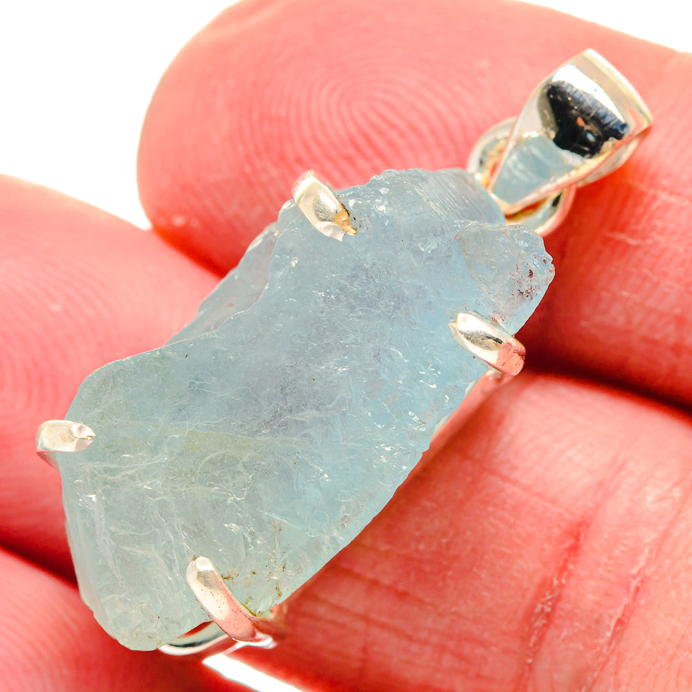 Rough aquamarine pendant in 925 sterling silver with prong-set open-back bail