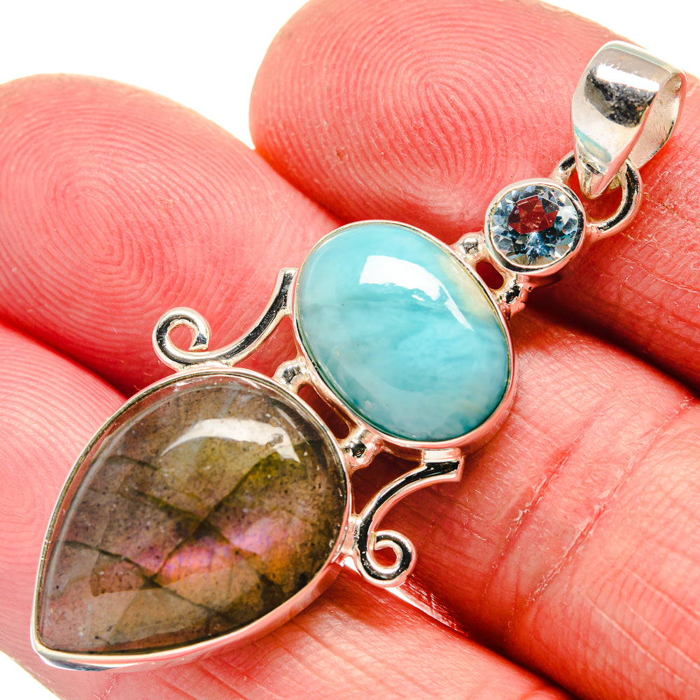 Sterling silver pendant with oval larimar and teardrop labradorite, blue topaz round
