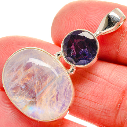 925 sterling silver pendant with round rainbow moonstone and deep purple faceted stone