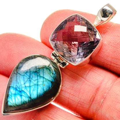 Sterling silver pendant: faceted purple stone and blue-green labradorite cabochon
