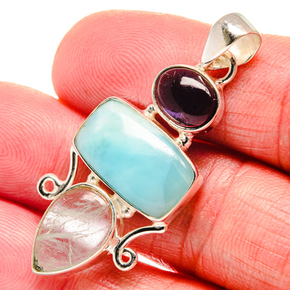 Sterling silver pendant with rectangular aqua cabochon, maroon oval, clear teardrop bail