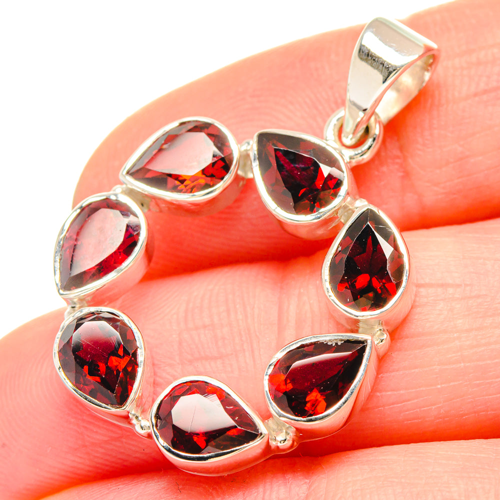 925 sterling silver garnet pendant with red faceted teardrop stones in bezel settings