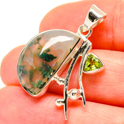 Sterling silver moss agate pendant close-up with peridot green drop