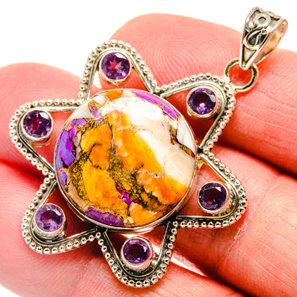 Spiny oyster pendant close-up with purple amethyst round stones in silver filigree