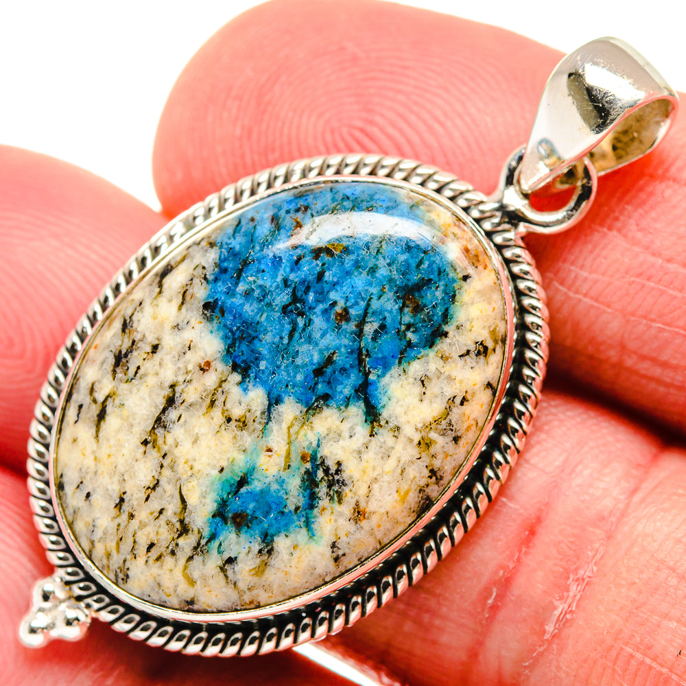 Sterling silver oval azurite pendant with blue stone bezel and bail