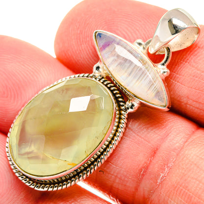 Close-up oval yellow-green pendant with beaded bezel and iridescent moonstone teardrop cap