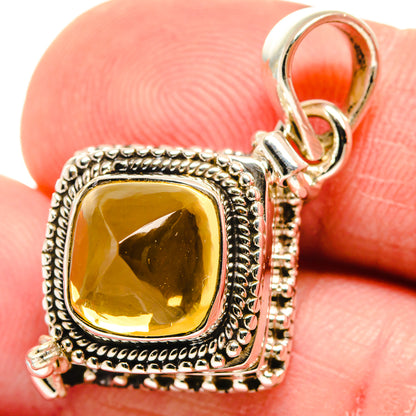 Sterling silver citrine pendant with square yellow gemstone and ornate halo bezel