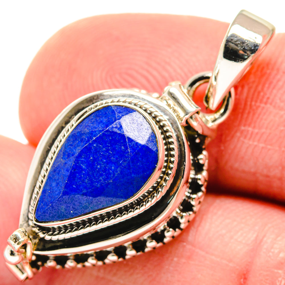 Sterling silver lapis lazuli pendant with teardrop blue stone and beaded bezel