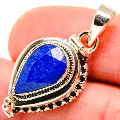 Sterling silver lapis lazuli pendant with teardrop blue stone and beaded bezel