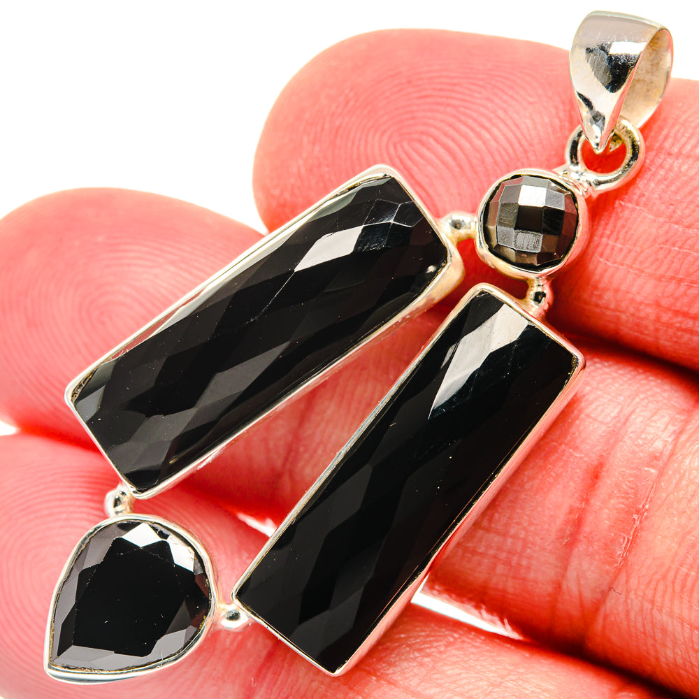 Sterling silver onyx cross pendant with black faceted stones and bail