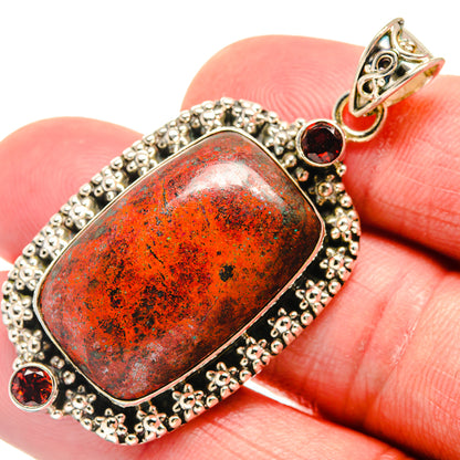 925 sterling silver garnet pendant, oval Sonora Sunrise stone, round red accents