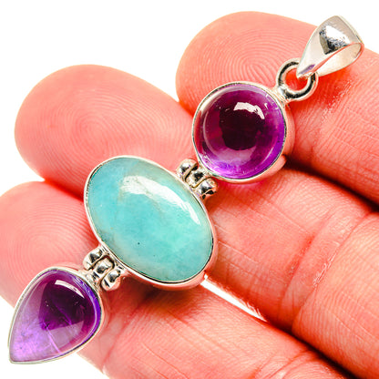 Sterling silver pendant with larimar oval, amethyst round and small teardrop stones