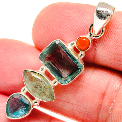 Sterling silver gemstone pendant close-up: teal square, oval green and blue stones, red beads