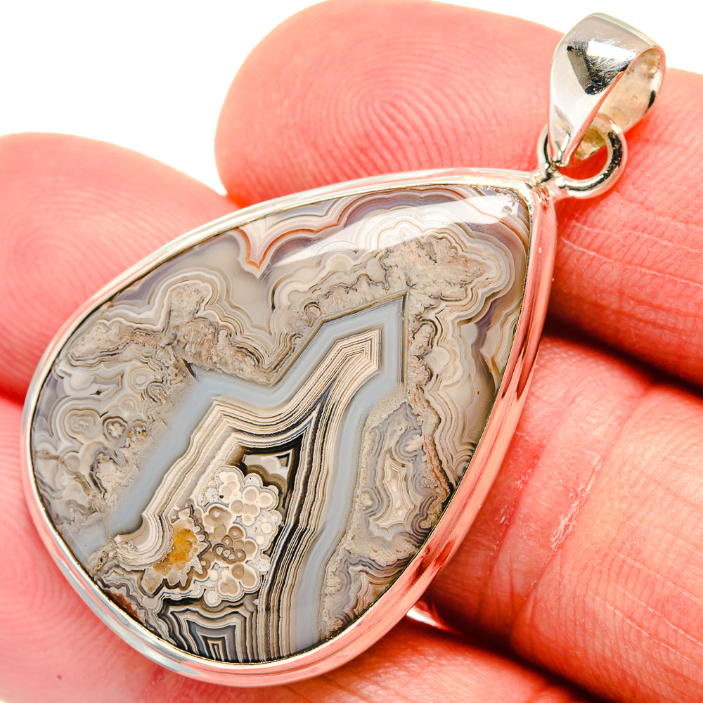Sterling silver teardrop pendant with lace agate stone and top bail
