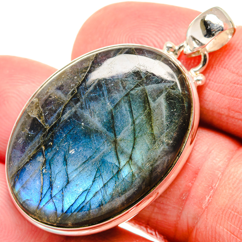 Labradorite sterling silver oval pendant with blue-green iridescent stone and bail