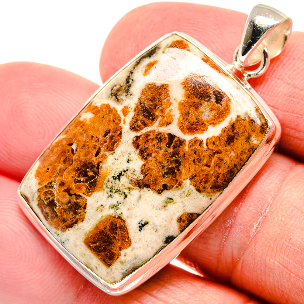 Rectangular muscovite pendant, orange-brown mottled stone in silver frame