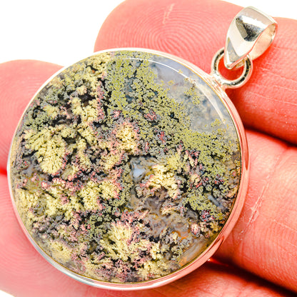 Plume agate pendant with silver bezel and round loop bail, multicolor mineral stone.