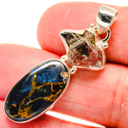 Sterling silver pendant with blue-gold pietersite oval and clear quartz crystal charm
