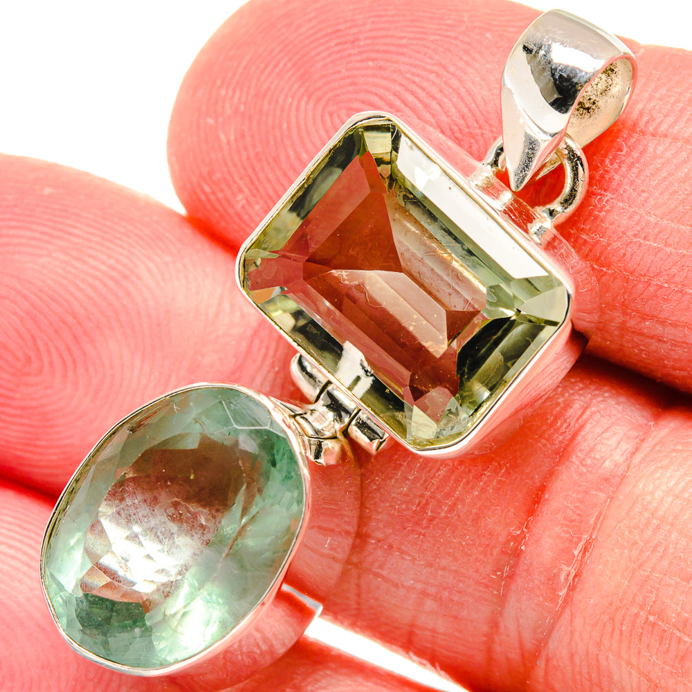 Sterling silver pendant with faceted green amethyst and green oval cabochon, top bail