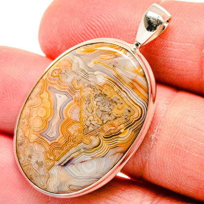 Sterling silver lace agate pendant with oval bezel, tan and white banded gemstone